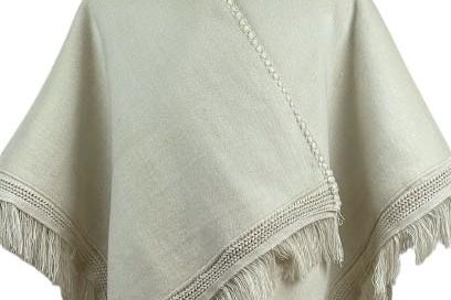 Alpaca Cape Wrap Poncho – Handcrafted, soft, and warm wrap made from luxurious alpaca fiber. Elegant, hypoallergenic, and perfect for versatile, stylish layering. Solid color in ivory.