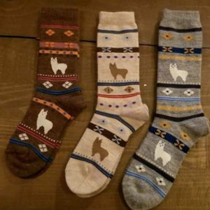 Three Socks With Alpaca Patterns
