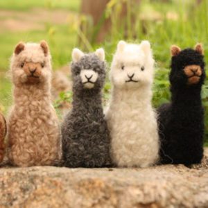 Four Alpaca Dolls In Various Sizes
